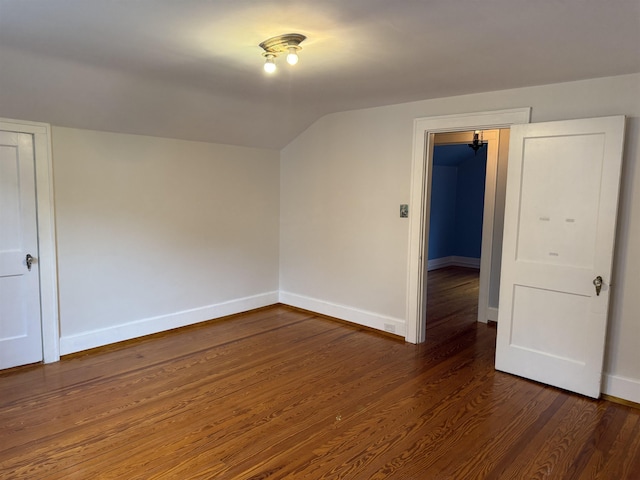 228 Hendren Ave, Staunton, VA 24401 - spare room featuring baseboards, wood finished floors, and lofted ceiling