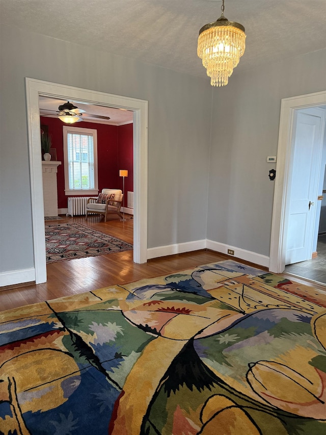 228 Hendren Ave, Staunton, VA 24401 - entryway with wood finished floors, a chandelier, baseboards, and ceiling fan