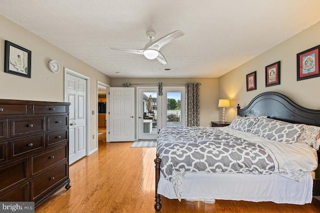 1066 Honeyville Rd, Stanley, VA 22851 - bedroom with access to outside, light wood-style floors, ceiling fan, and a textured ceiling