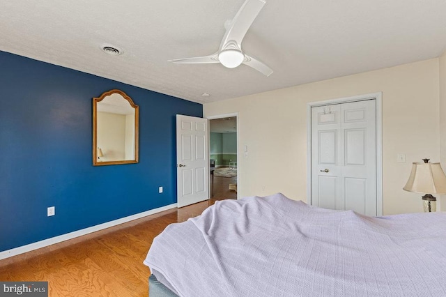 1066 Honeyville Rd, Stanley, VA 22851 - bedroom featuring wood finished floors, baseboards, and ceiling fan