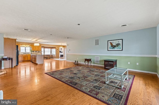 1066 Honeyville Rd, Stanley, VA 22851 - living area with light wood-style floors and baseboards