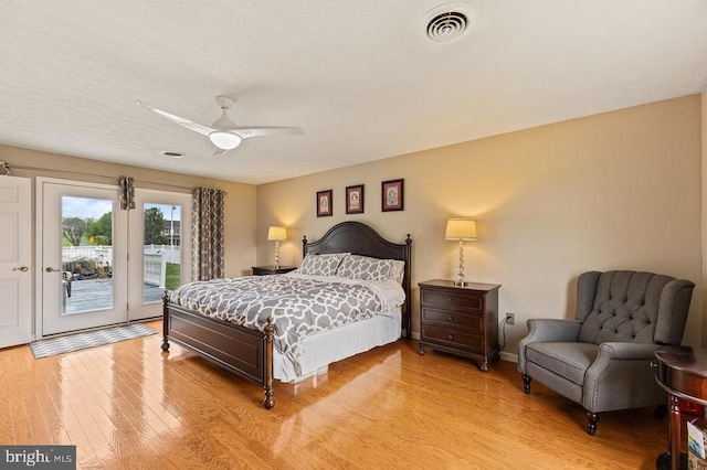 1066 Honeyville Rd, Stanley, VA 22851 - bedroom featuring access to exterior, light wood-type flooring, and a ceiling fan