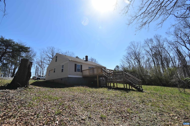 4490 James Madison Hwy, Gordonsville, VA 22942 - view of side of home featuring a deck and stairway
