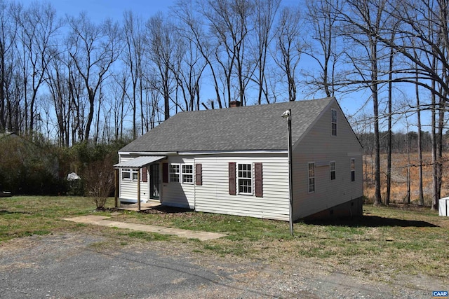 4490 James Madison Hwy, Gordonsville, VA 22942 - view of front of property featuring roof with shingles, a chimney, and crawl space