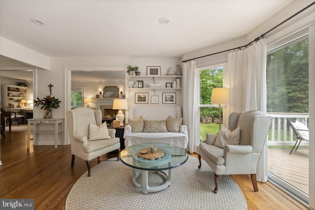  - living room with a fireplace and wood finished floors