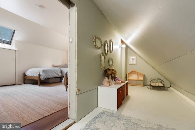 - additional living space featuring vaulted ceiling and a skylight
