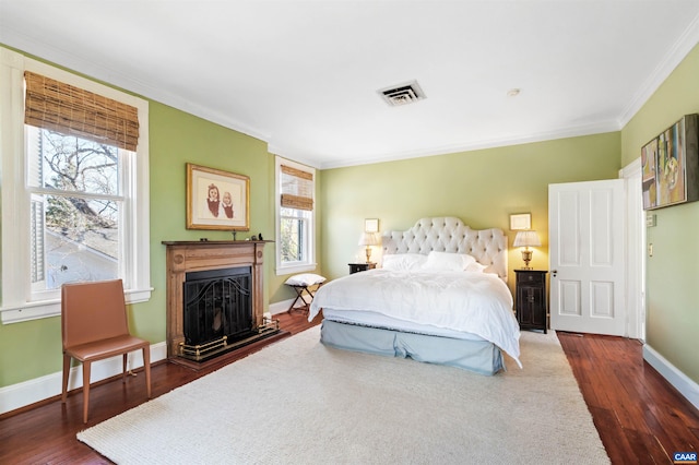 900 Rugby Rd, Charlottesville, VA 22903 - bedroom with dark wood-style flooring, crown molding, multiple windows, and visible vents