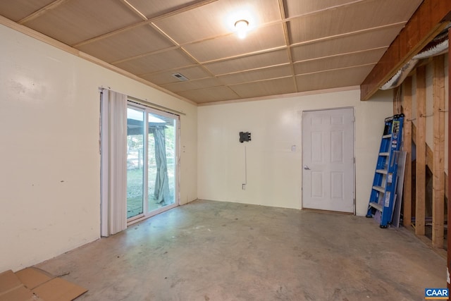 empty room featuring unfinished concrete flooring