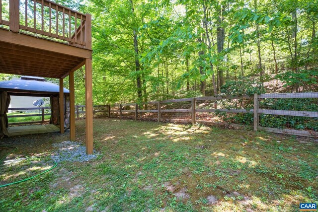 25 Bearwood Dr S, Palmyra, VA 22963 - fenced backyard with a gazebo and a deck