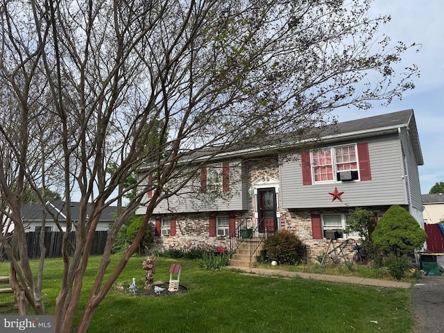 split foyer home featuring cooling unit