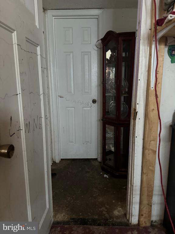 hallway featuring concrete flooring