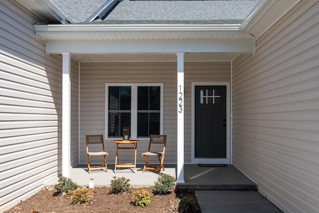 doorway to property with a porch