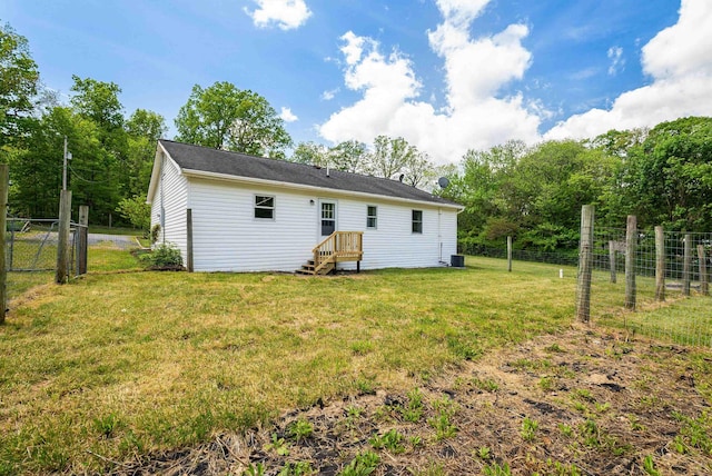 rear view of property with cooling unit