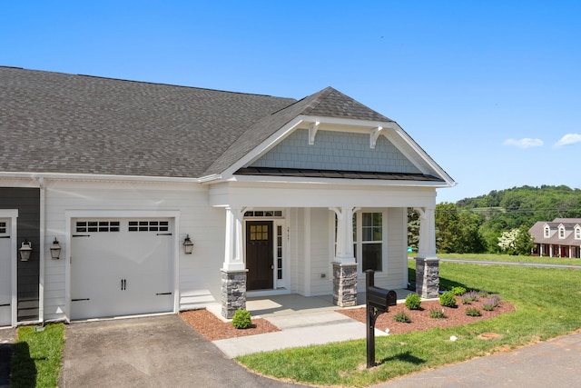2797 Rutlege Rd Unit 197, Rockingham, VA 22801 - craftsman house with covered porch, an attached garage, driveway, roof with shingles, and a front yard
