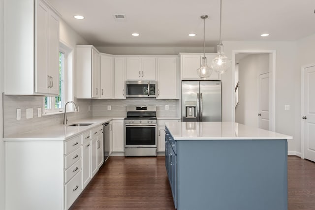 2797 Rutlege Rd Unit 197, Rockingham, VA 22801 - kitchen with stainless steel appliances, a sink, white cabinets, light countertops, and recessed lighting