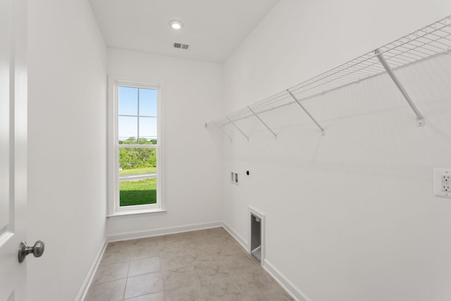 2797 Rutlege Rd Unit 197, Rockingham, VA 22801 - laundry area featuring baseboards and electric dryer hookup