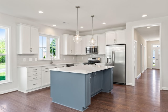 2797 Rutlege Rd Unit 197, Rockingham, VA 22801 - kitchen with appliances with stainless steel finishes, white cabinets, a sink, light countertops, and tasteful backsplash