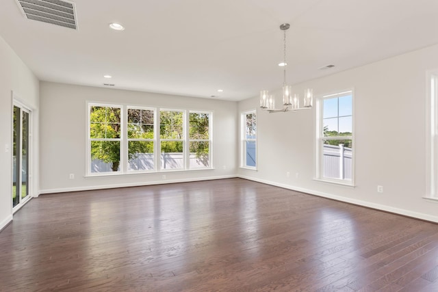 2797 Rutlege Rd Unit 197, Rockingham, VA 22801 - empty room featuring a chandelier, dark wood-type flooring, recessed lighting, and baseboards