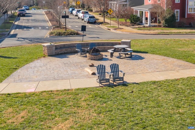view of patio featuring a fire pit