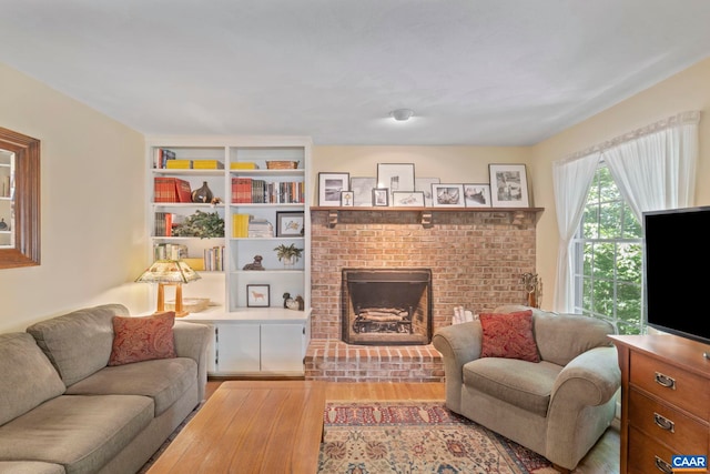 2 Whippoorwill Ln, Palmyra, VA 22963 - living area with wood finished floors and a fireplace