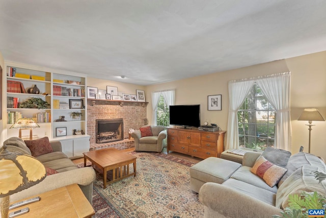 2 Whippoorwill Ln, Palmyra, VA 22963 - living area with a fireplace and wood finished floors
