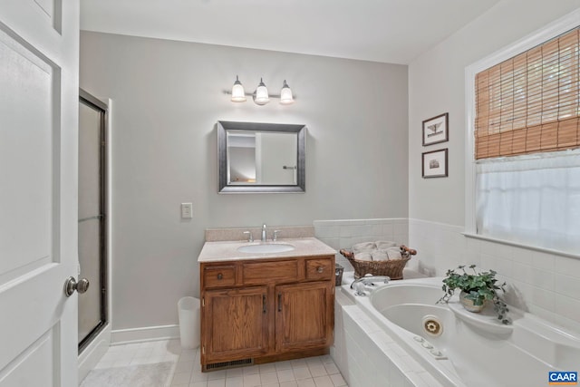 2 Whippoorwill Ln, Palmyra, VA 22963 - bathroom with a tub with jets, a stall shower, vanity, and tile patterned floors