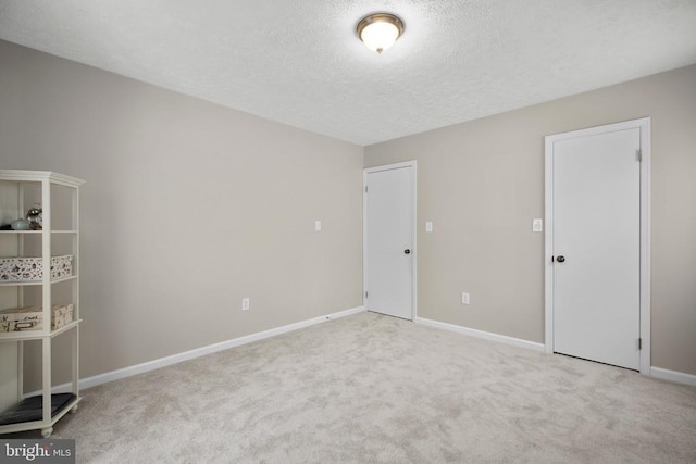 740 Lakeview Pkwy, Locust Grove, VA 22508 - unfurnished bedroom with carpet floors, a textured ceiling, and baseboards