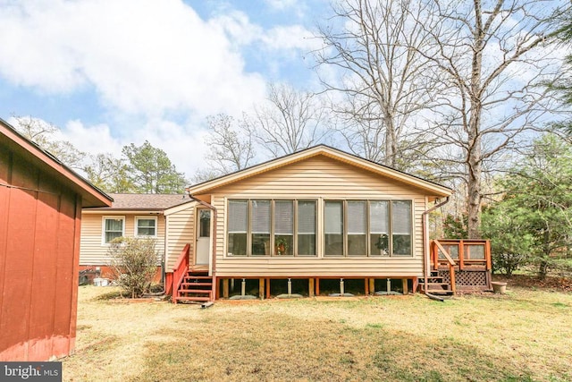740 Lakeview Pkwy, Locust Grove, VA 22508 - back of property with a deck and a lawn