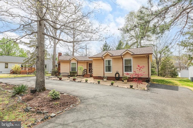 740 Lakeview Pkwy, Locust Grove, VA 22508 - ranch-style home featuring crawl space, driveway, a shingled roof, and a chimney