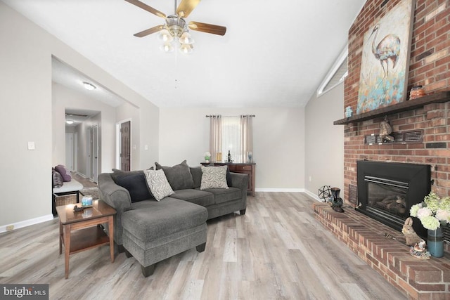 740 Lakeview Pkwy, Locust Grove, VA 22508 - living area featuring wood finished floors, a ceiling fan, a fireplace, baseboards, and lofted ceiling