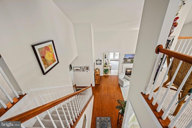 5715 Kesslers Xing W, Fredericksburg, VA 22407 - corridor with wood finished floors and an upstairs landing