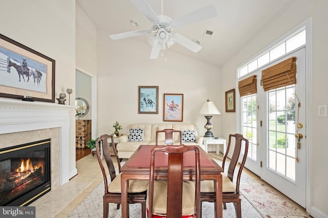 5715 Kesslers Xing W, Fredericksburg, VA 22407 - dining space with high vaulted ceiling, a ceiling fan, and a premium fireplace