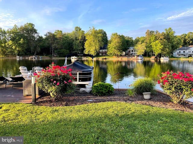 1411 Lakeview Pkwy, Locust Grove, VA 22508 - dock area featuring a water view and a lawn