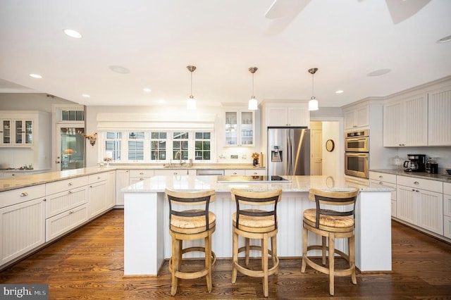 1411 Lakeview Pkwy, Locust Grove, VA 22508 - kitchen with stainless steel appliances, glass insert cabinets, white cabinets, light stone counters, and recessed lighting