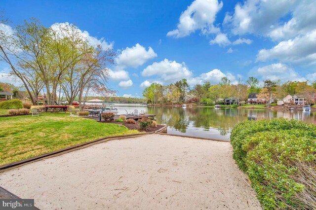 1411 Lakeview Pkwy, Locust Grove, VA 22508 - view of property's community with a water view, a lawn, and a dock