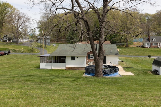 911 Old White Hill Rd, Stuarts Draft, VA 24477 - back of house with a sunroom and a lawn