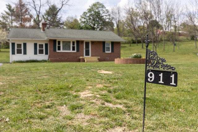 911 Old White Hill Rd, Stuarts Draft, VA 24477 - single story home featuring a chimney, brick siding, and a front lawn