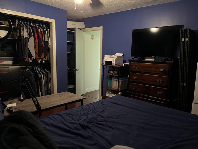 911 Old White Hill Rd, Stuarts Draft, VA 24477 - bedroom featuring a textured ceiling, a closet, and ceiling fan