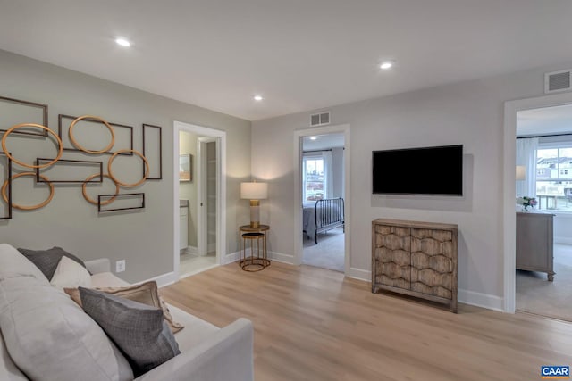 3053 Rambling Brook Ln, Crozet, VA 22932 - living area with light wood-style floors and recessed lighting