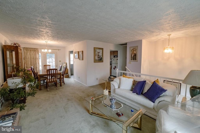 802 Shamrock Dr, Fredericksburg, VA 22407 - living area featuring light colored carpet, a chandelier, and a textured ceiling