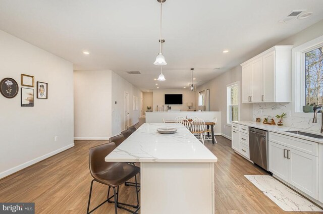 208 Yorktown Blvd, Locust Grove, VA 22508 - kitchen featuring electric stove, wall chimney range hood, white cabinetry, and decorative backsplash