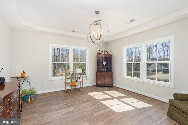 208 Yorktown Blvd, Locust Grove, VA 22508 - sitting room with a chandelier, healthy amount of natural light, wood finished floors, and baseboards