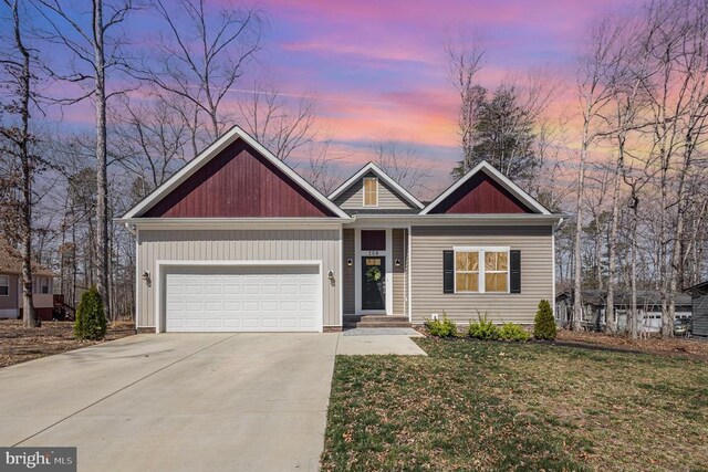208 Yorktown Blvd, Locust Grove, VA 22508 - view of front of house with driveway, an attached garage, roof with shingles, and a front lawn