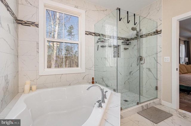 208 Yorktown Blvd, Locust Grove, VA 22508 - bathroom featuring a shower stall, ensuite bath, a garden tub, and marble finish floors