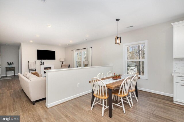 208 Yorktown Blvd, Locust Grove, VA 22508 - dining area featuring wood finished floors, recessed lighting, and baseboards