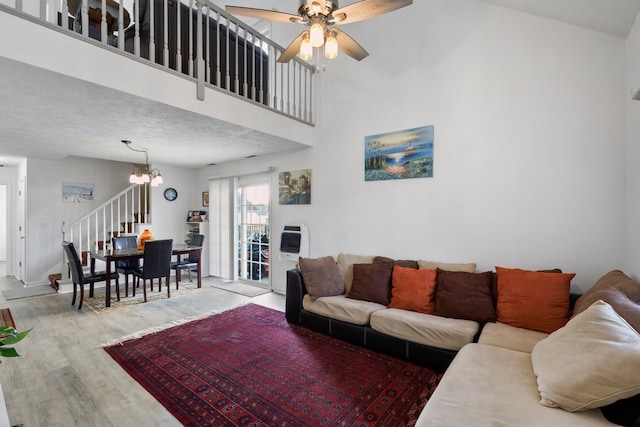 200 Kingsport Rd, Waynesboro, VA 22980 - living area with wood finished floors, stairway, a chandelier, and ceiling fan