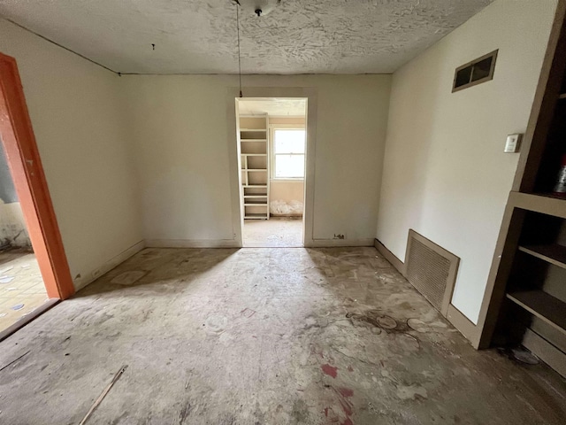 1201 Burnett St, Staunton, VA 24401 - unfurnished dining area with visible vents and a textured ceiling