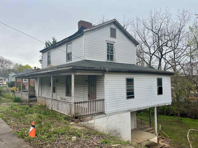 1201 Burnett St, Staunton, VA 24401 - view of front of home with covered porch and a chimney