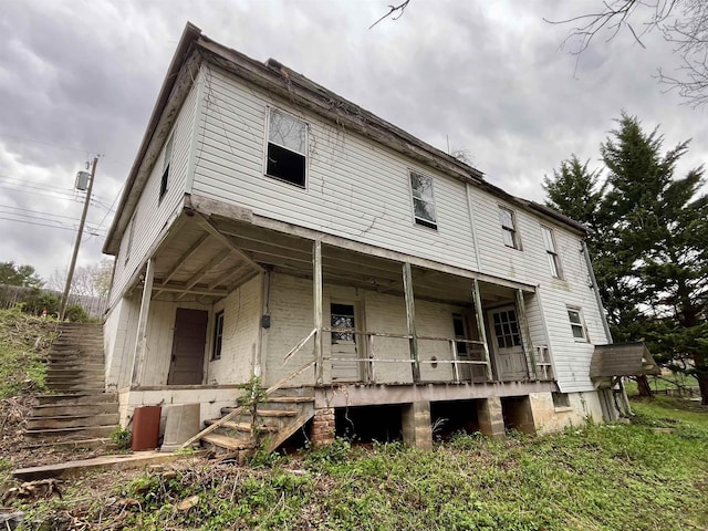 1201 Burnett St, Staunton, VA 24401 - rear view of property with stairway and covered porch
