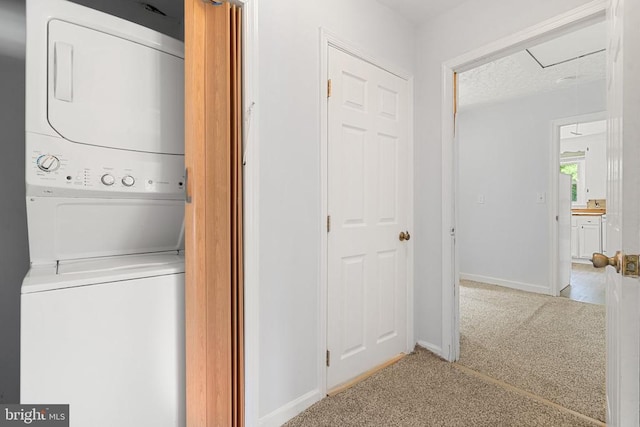 19012 Lahore Rd, Orange, VA 22960 - laundry area featuring estacked washer and dryer and carpet flooring